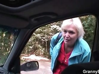 Old granny rides my cock right in the car!